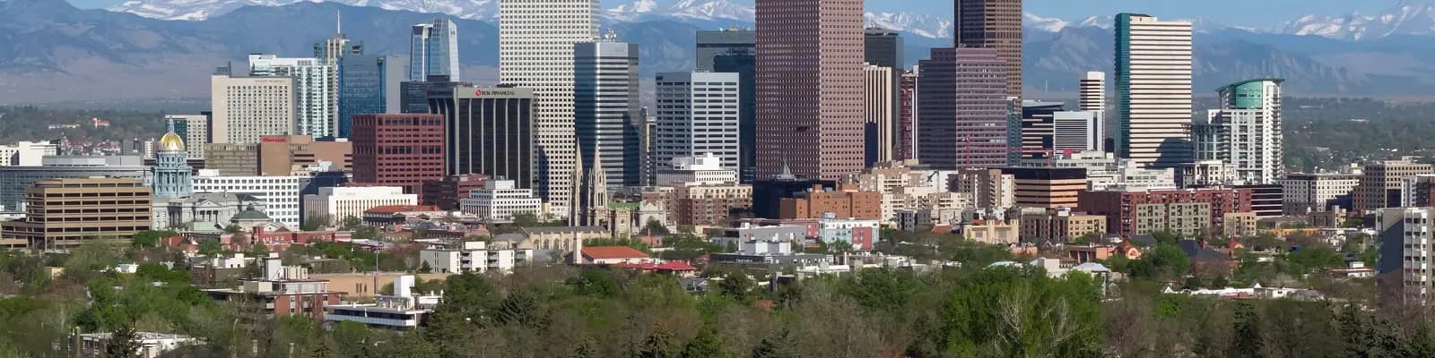 Denver skyline with the Rocky Mountains behind, United States